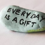 Stone with motivational message